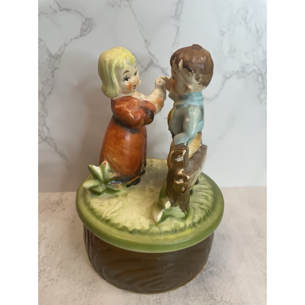 Vintage SANKYO Japan Music Box With Ceramic Rotating Boy And Girl With Bird